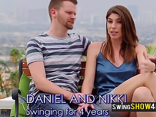 American swinger couples talk about their sexual experiences before entering the Red Orgy Room.